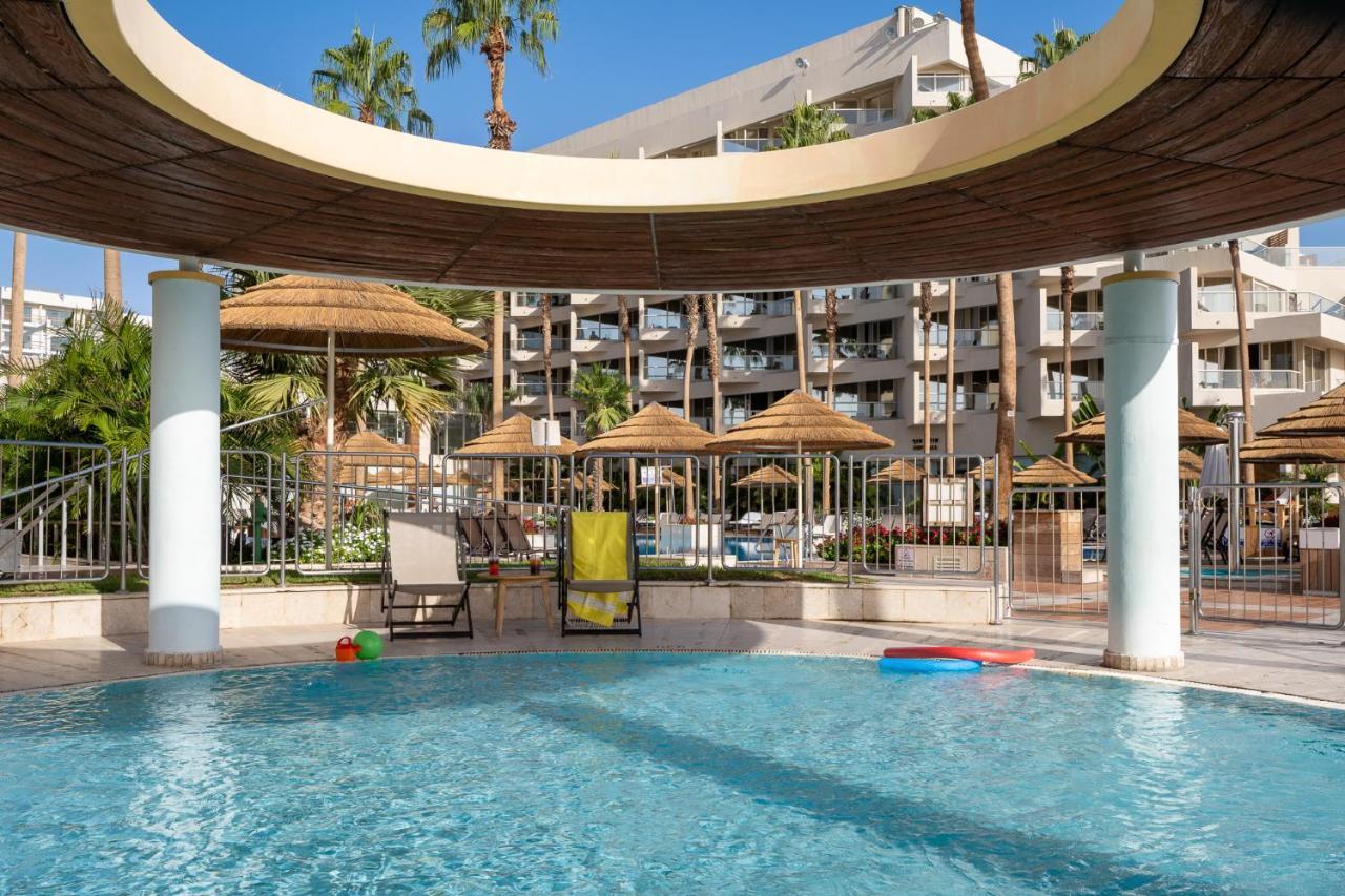Hotel Aria Eilat Exterior foto The pool at the Hilton Anatole